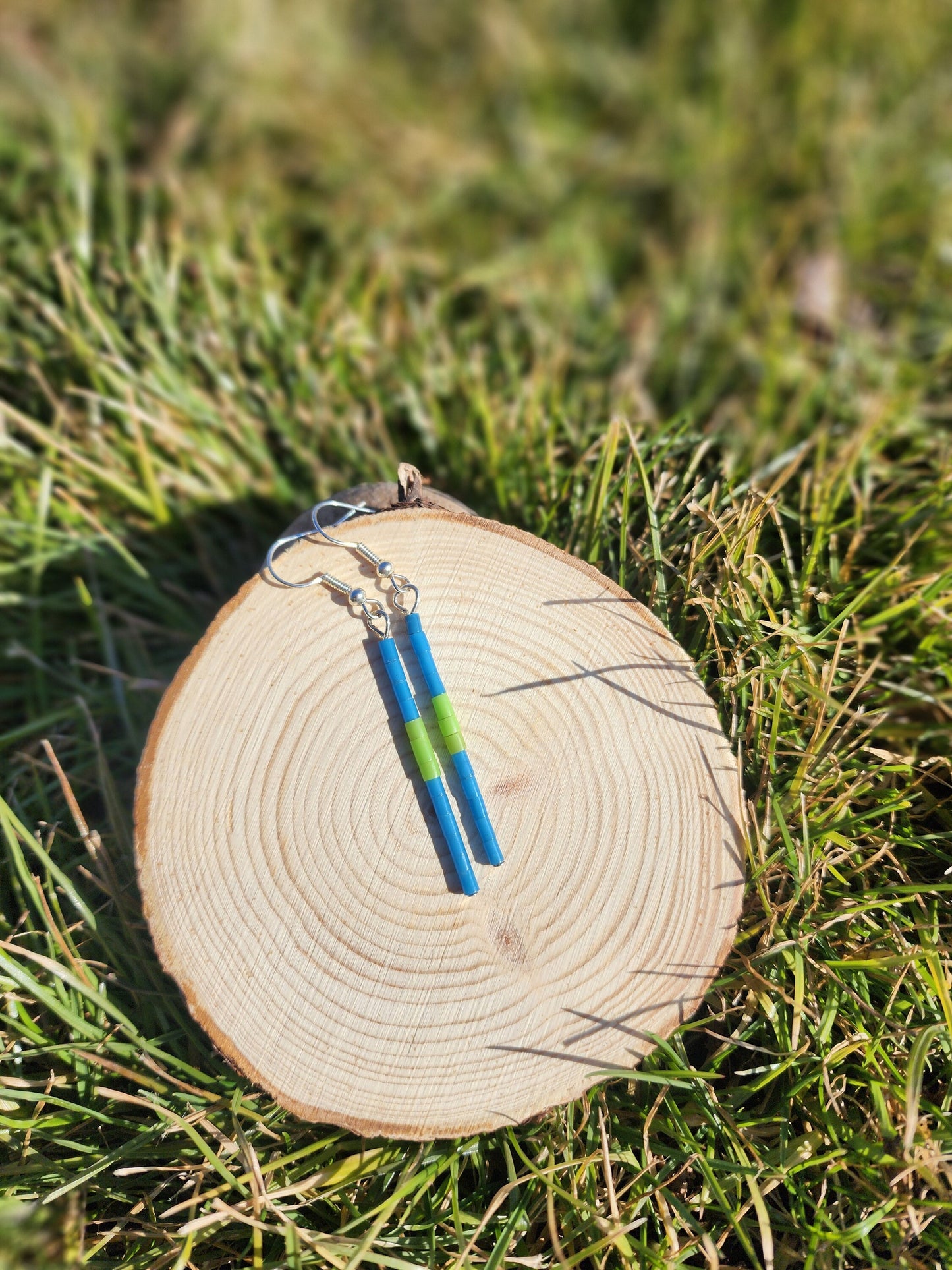 Blue and green dangly synthetic heishi beaded earrings