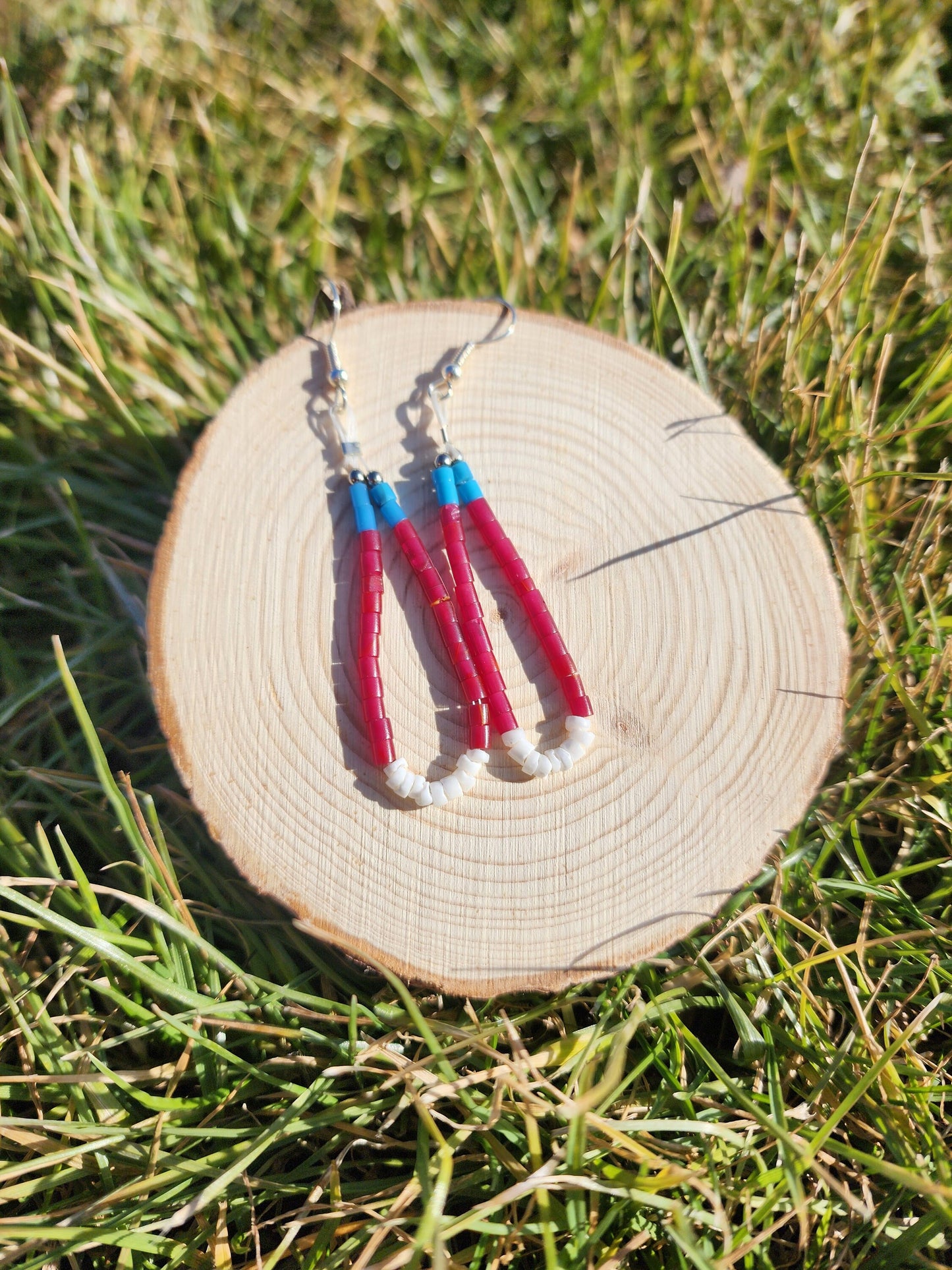 Traditonal Navajo red white blue synthetic heishi and white shell dangly earrings