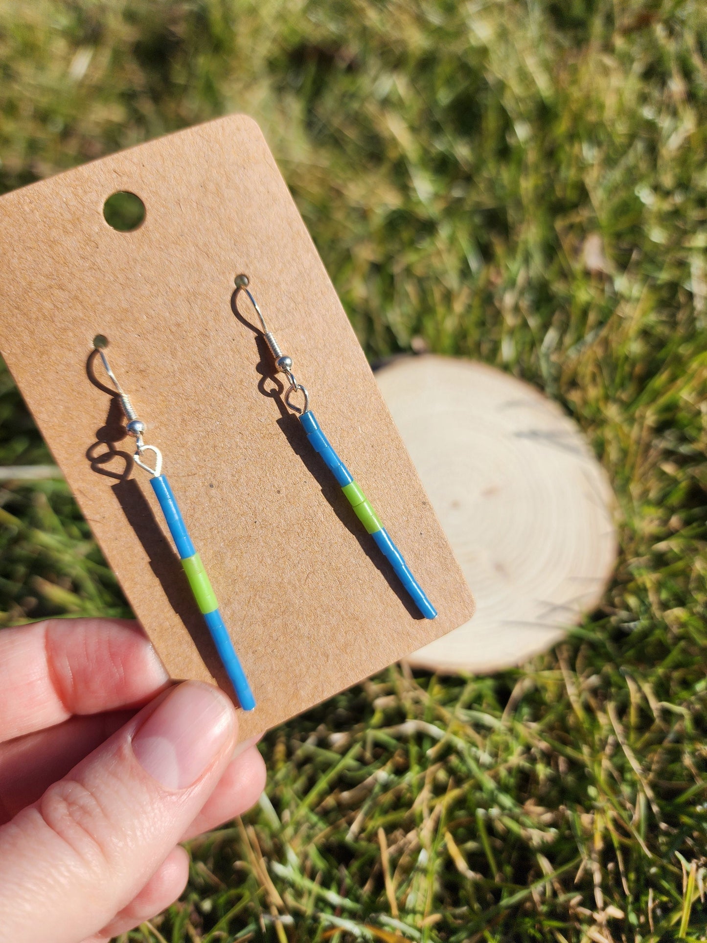 Blue and green dangly synthetic heishi beaded earrings