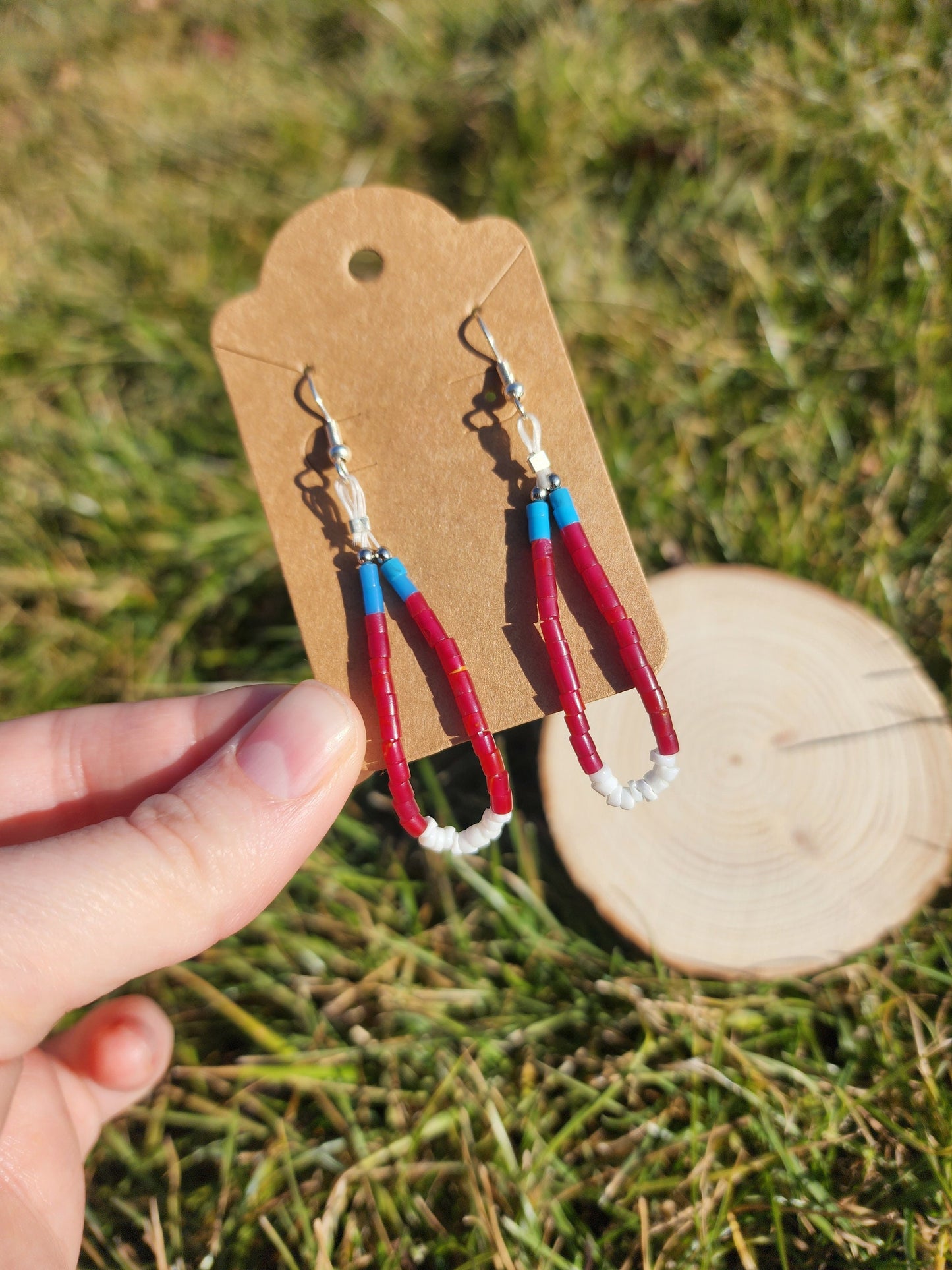 Traditonal Navajo red white blue synthetic heishi and white shell dangly earrings