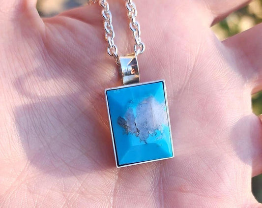 Sterling silver Ithica peak Turquoise Navajo pendant